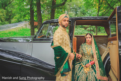 Bride and groom in their classic car Bride and groom in their classic car