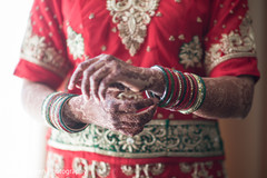Charming indian bride adjusting her jewelry.. Charming indian bride adjusting her jewelry..