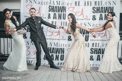 Fun photography of indian couple and bridesmaids. Fun photography of indian couple and bridesmaids.
