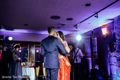 Indian couple having their first dance at wedding reception Indian couple having their first dance at wedding reception