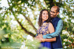 Indian couple hugging before sangeet ceremony Indian couple hugging before sangeet ceremony
