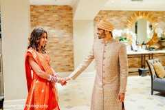 Indian couple seeing each other for the first time before wedding ceremony Indian couple seeing each other for the first time before wedding ceremony