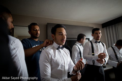 Indian groomsmen getting ready for wedding ceremony Indian groomsmen getting ready for wedding ceremony