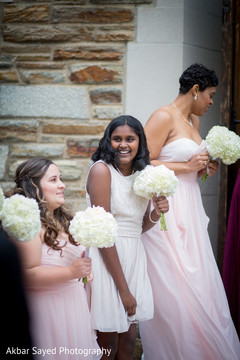 Indian bridesmaids outside wedding ceremony Indian bridesmaids outside wedding ceremony