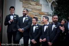 Indian groomsmen outside wedding ceremony Indian groomsmen outside wedding ceremony