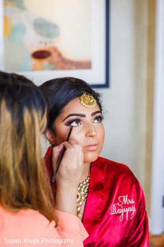 Lovely bride being dolled up for her big day. Lovely bride being dolled up for her big day.