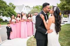 Indian couple kissing before wedding ceremony first look photography,indian bride ceremony fashion,indian groom fashion