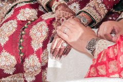 Sweet pakistani bride and groom holding hands. indian weddings,indian wedding photography,indian bride and groom