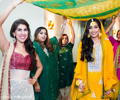 Stunning bride in yellow mehndi outfit. indian pre-wedding celebrations,indian wedding guests,pakistani bride