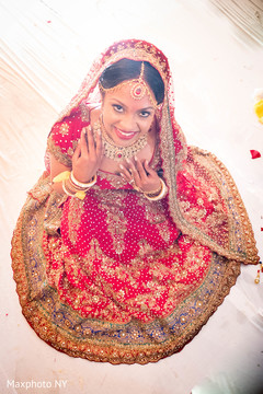 Maharani in traditional red lengha Maharani in traditional red lengha