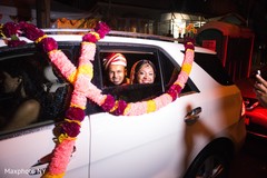 Bride and groom in their wedding car Bride and groom in their wedding car