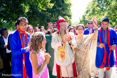 Indian groom escorted by family and friends. Indian groom escorted by family and friends.