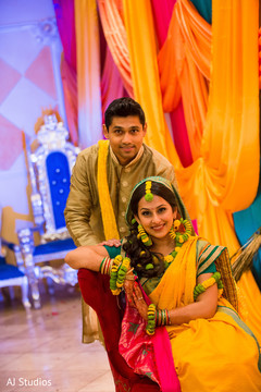 Bride and groom during sangeet indian sangeet
