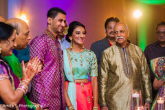 Bride and groom during sangeet Bride and groom during sangeet