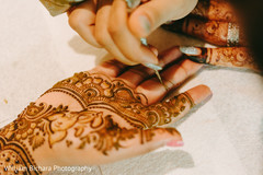 Henna application at mehndi ceremony Henna application at mehndi ceremony