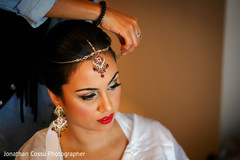 Marvelous indian bride's makeup look. indian bride getting ready,indian bride,indian bridal jewelry